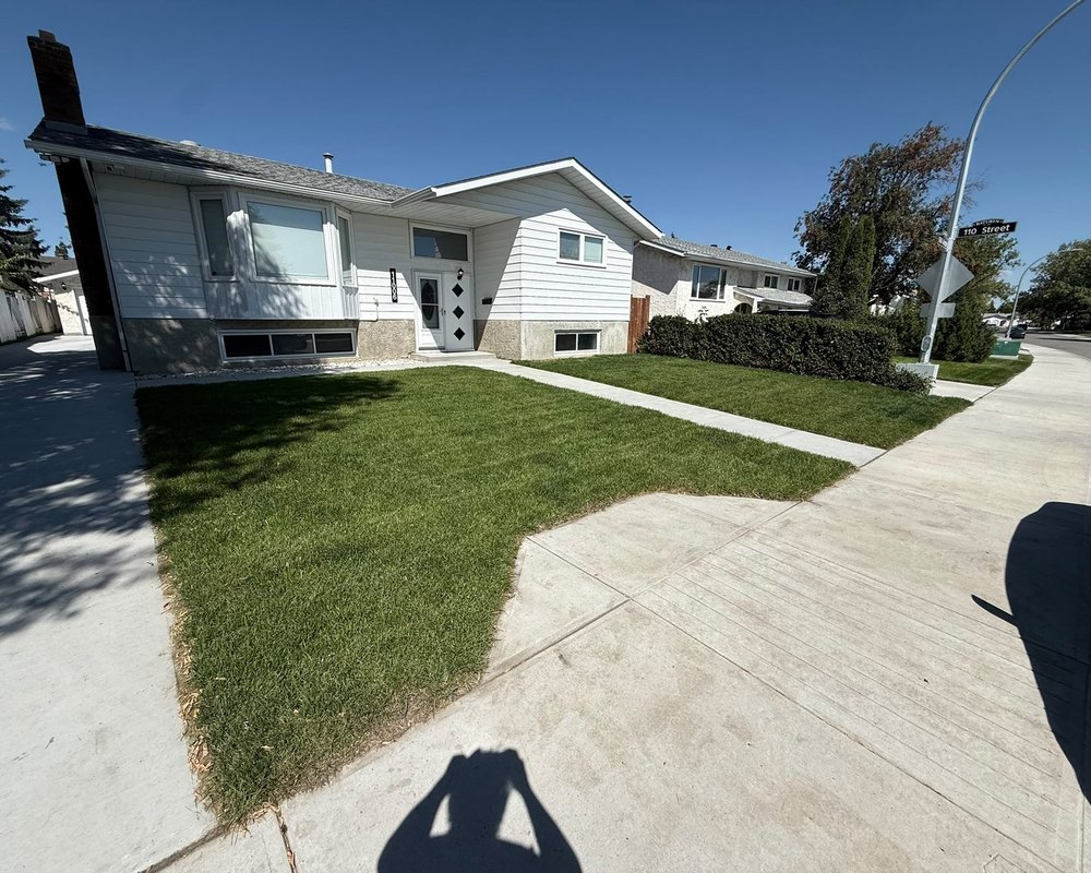 Landscaped garden path maintained by Mackay's Landscaping